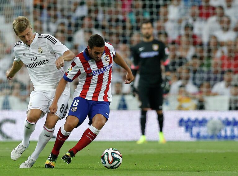 Полузащитник Реала Тони Кроос и полузащитник Атлетико Коке