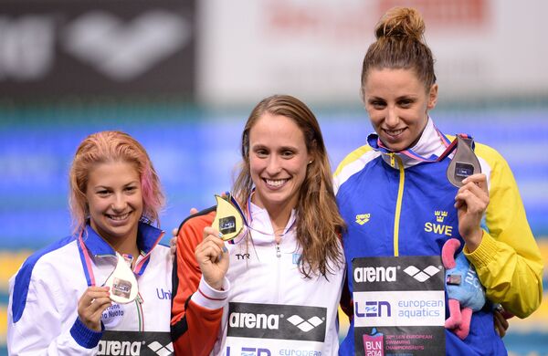 Йенни Юханссон (Швеция), завоевавшая серебряную медаль, Рикке Меллер Педерсен (Дания), завоевавшая золотую медаль, и Арианна Кастильони (Италия)