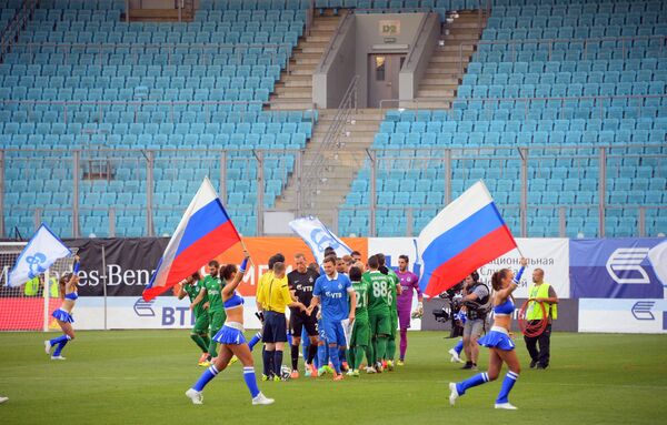 Пустая трибуна стадиона в матче раунда плей-офф Лиги Европы УЕФА-2014/2015 между ФК Динамо и ФК Омония.