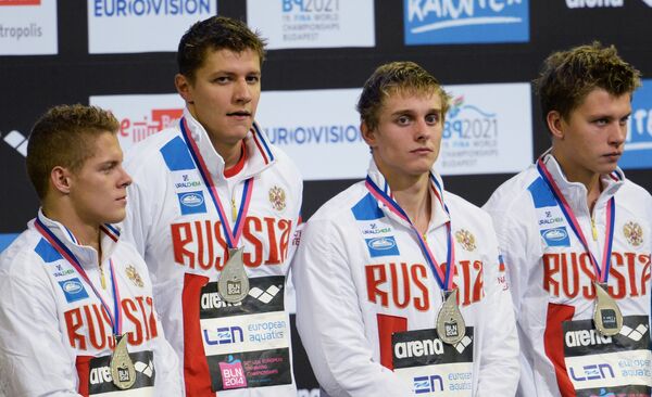 Российские спортсмены Александр Красных, Артем Лобузов, Александр Сухоруков и Дмитрий Ермаков (справа налево)