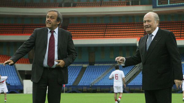 Президент УЕФА Мишель Платини и президент ФИФА Йозеф Блаттер (слева направо)