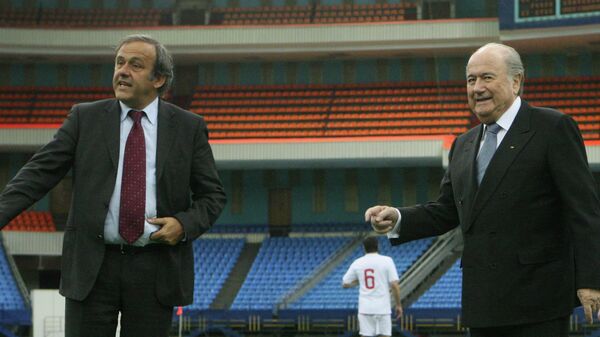 Президент УЕФА Мишель Платини и президент ФИФА Йозеф Блаттер (слева направо)