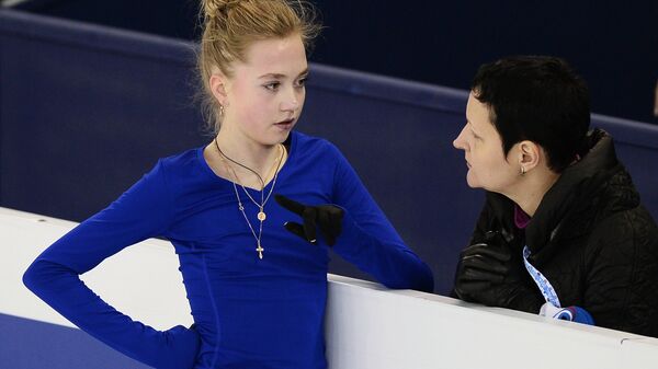 Слева направо: Елена Радионова (Россия) и тренер Инна Гончаренко
