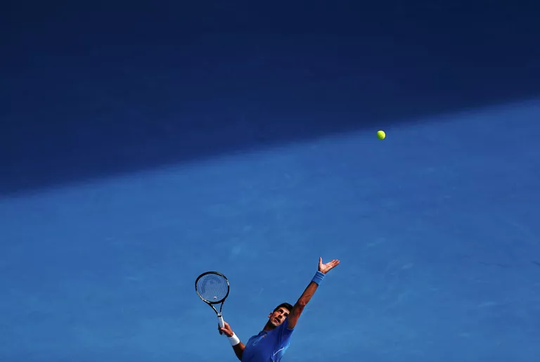 Новак Джокович в матче первого круга Australian Open Новак Джокович в матче первого круга Australian Open