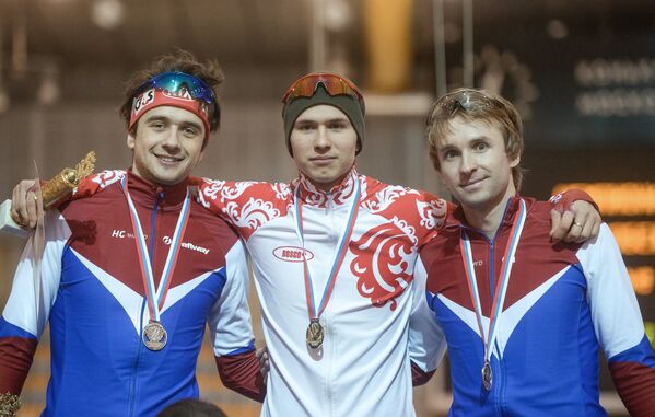Денис Юсков – серебряная медаль, Павел Кулижников – золотая медаль, Алексей Есин – бронзовая медаль (слева направо)