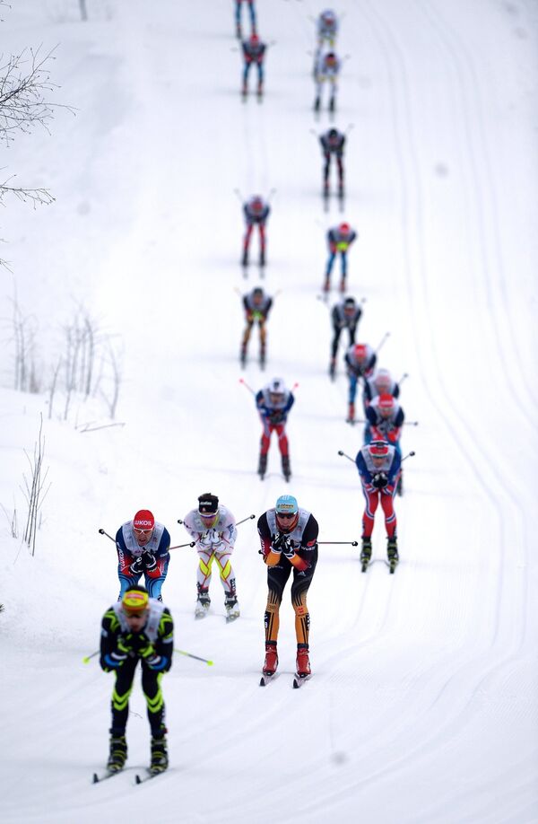 Спортсмены на дистанции скиатлона