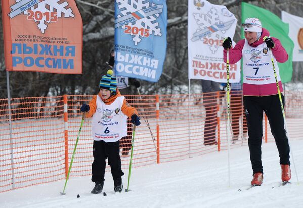 Двукратная олимпийская чемпионка, российская биатлонистка Анна Богалий-Титовец с сыном