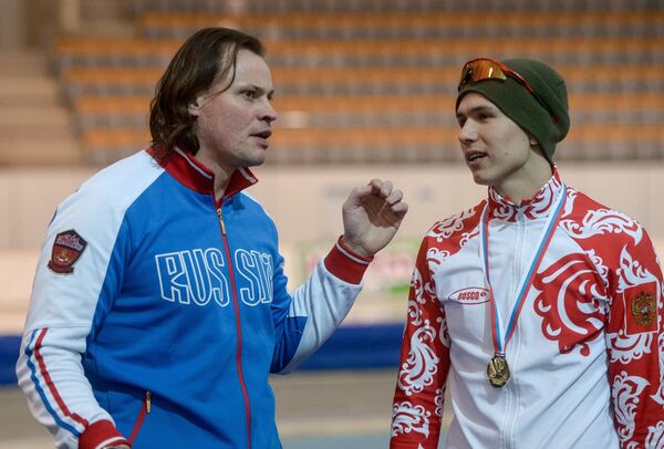 Павел Кулижников (справа)  и тренер Дмитрий Дорофеев