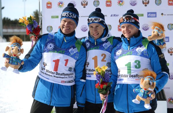 Российские спортсмены Сергей Ермилов, Владимир Майоров, Алексей Грошев (слева направо)