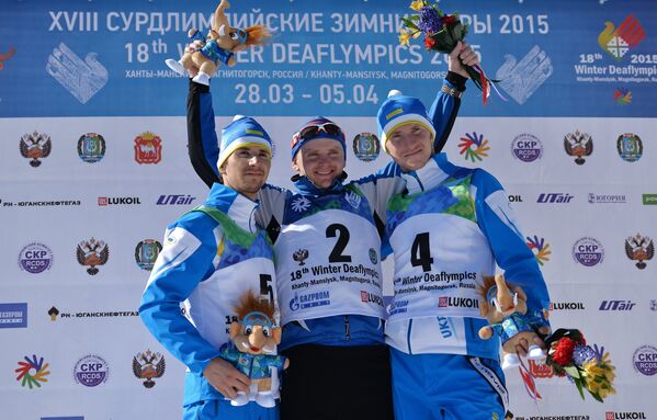 Призеры спринта среди мужчин по лыжным гонкам на XVIII Сурдлимпийских зимних играх в Ханты-Мансийске