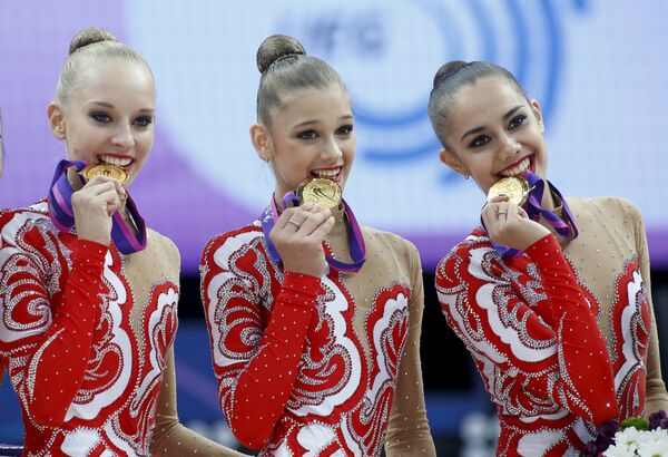 Российские гимнастки Яна Кудрявцева, Александра Солдатова и Маргарита Мамун (слева направо)