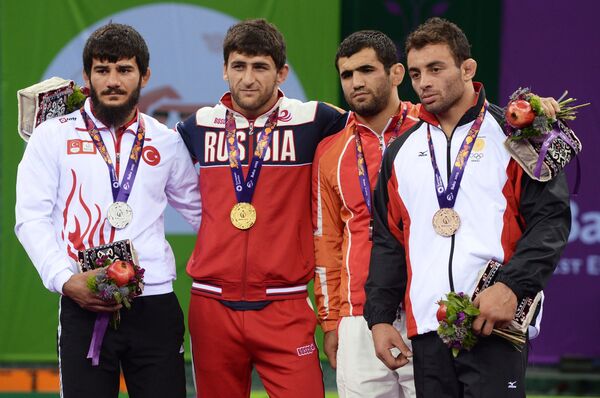 Сонер Демирташ (Турция) - серебряная медаль, Аниуар Гедуев (Россия) - золотая медаль, Джабриал Хасанов (Азербайджан) - бронзовая медаль, Джумбер Квелашвили (Грузия)