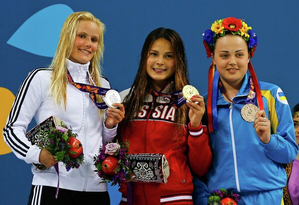 Луиза Ставчински, Мария Полякова и Диана Шелестюк (слева направо)