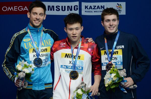Илья Кваша (Украина) - серебряная медаль, Сыи Се  (Китай) - золотая медаль, Майк Хиксон (США) - бронзовая медаль (слева направо)