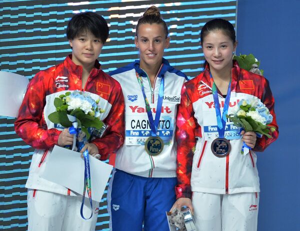 Ши Тинмао (Китай) - серебряная медаль, Таня Каньотто (Италия) - золотая медаль, Хэ Цзы (Китай) - бронзовая медаль (слева направо)