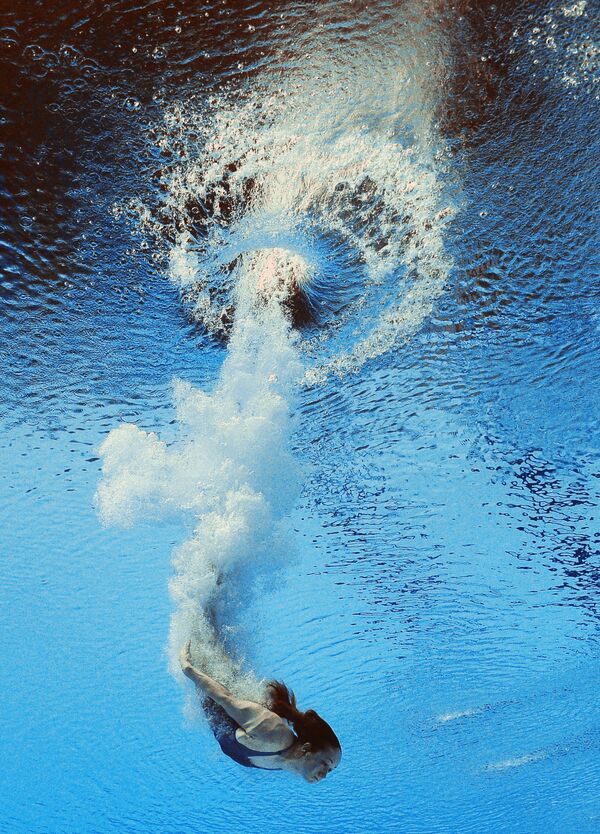 Алена Хамулькина (Белоруссия) в финале командных соревнований по прыжкам в воду с трамплина 3 м