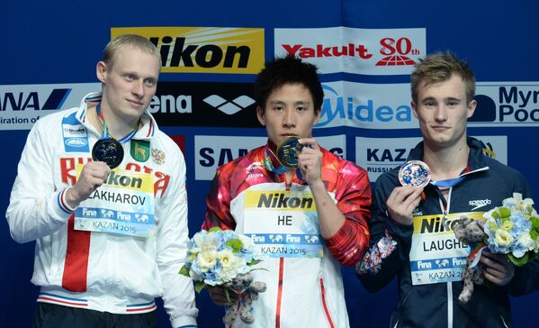 Илья Захаров (Россия) - серебряная медаль, Хэ Чао (Китай) - золотая медаль, Джек Дэвид Лафер (Великобритания) - бронзовая медаль (слева направо)