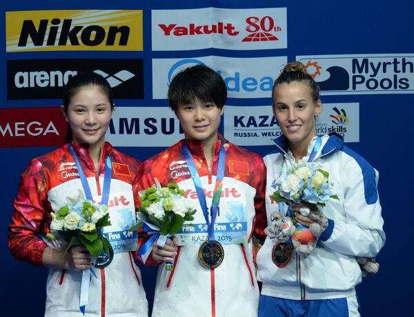 Хэ Цзы (КНР) - серебряная медаль, Ши Тинмао (КНР) - золотая медаль, Таня Каньотто (Италия) - бронзовая медаль (слева направо)