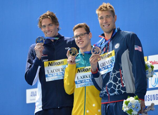 Камиль Лакур (Франция) - серебряная медаль, Мэтт Гриверс (США) - золотая медаль, Митчелл Ларкин (Австралия) - бронзовая медаль (слева направо)