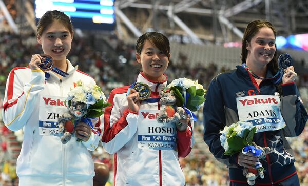 Чжан Юйфэй (КНР) - бронзовая медаль, Натсуми Хоси (Япония) - золотая медаль, Кэммил Адамс (США) - серебряная медаль (слева направо)