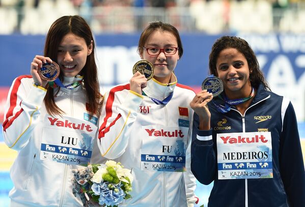 Сян Лю (КНР) - бронзовая медаль, Юаньхуэй Фу (КНР) - золотая медаль, Этьен Медейрос (Бразилия) - серебряная медаль (слева направо)