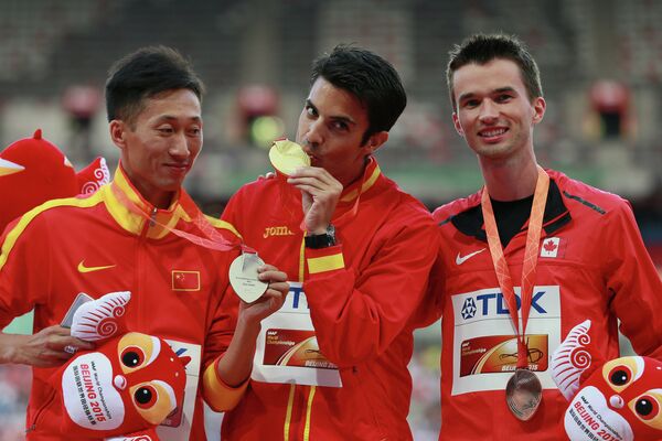 Ван Чжэнь (Китай), Мигель Анхель Лопес (Испания) и Бенжамин Торн (Канада) (слева направо)