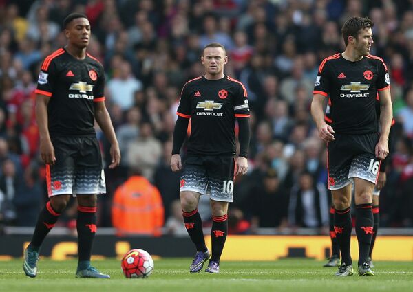 Футболисты Манчестер Юнайтед Антони Марсьяль, Уэйн Руни и Майкл Каррик (слева направо)