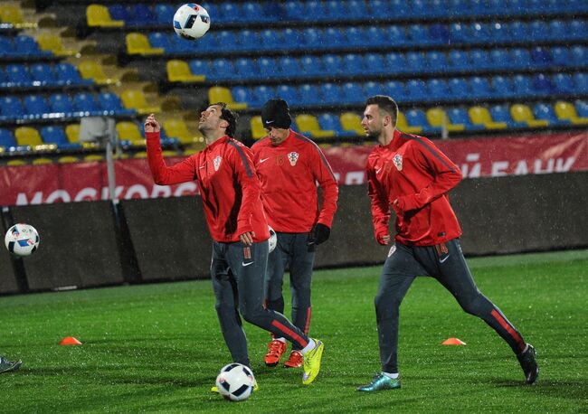 Футболисты сборной Хорватии Дарио Срна, Ивица Олич и Марсело Брозович (слева направо)