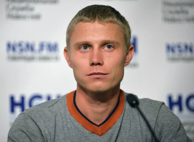 Легкоатлет Виктор Угаров