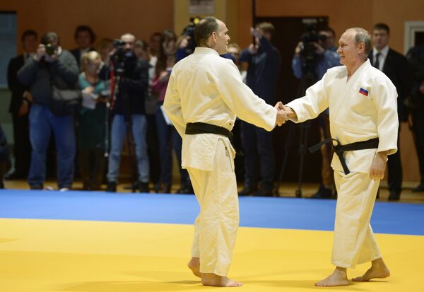Владимир Путин (справа) и Эцио Гамба