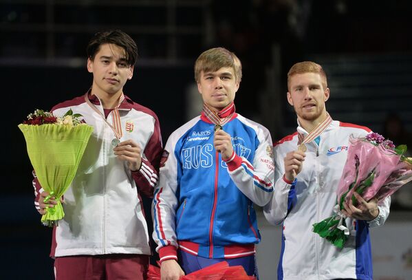 Шандор Лю Шаолинь - серебряная медаль, Семен Елистратов - золотая медаль, Венсан Жанн - бронзовая медаль (слева направо)