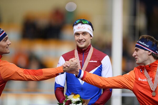 Кьелд Нейс (Нидерланды) - второе место, Денис Юсков (Россия) - первое место, Томас Крол (Нидерланды) - третье место (слева направо)