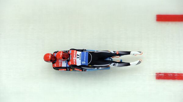 Тони Эггерт и Саша Бенеккен в соревнованиях двоек на чемпионате Европы по санному спорту