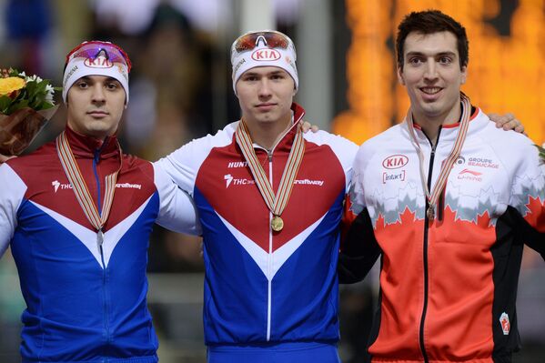 Руслан Мурашов - серебряная медаль, Павел Кулижников - золотая медаль, Алекс Буасвер-Лакруа - бронзовая медаль (слева направо)