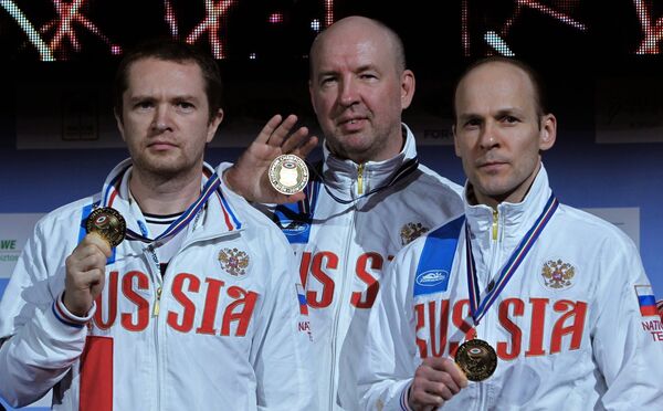 Российские спортсмены Антон Гурьянов, Владимир Исаков и Владимир Гончаров (слева направо)