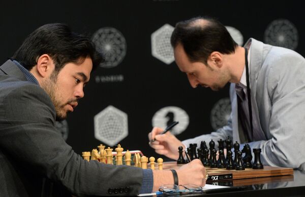 Слева направо: гроссмейстеры Хикару Накамура и Веселин Топалов