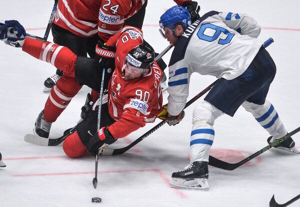 Игровой момент матча Канада - Финляндия