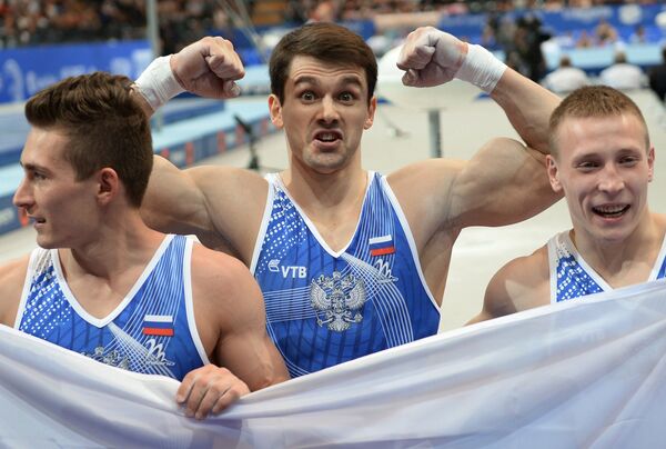 Российские гимнасты Давид Белявский, Николай Куксенков и Денис Аблязин (слева направо)