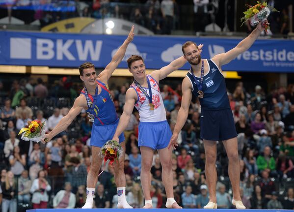 Слева направо: Марьян Драгулеску (Румыния) - серебряная медаль, Никита Нагорный (Россия) - золотая медаль, Александр Шатилов (Израиль) - бронзовая медаль