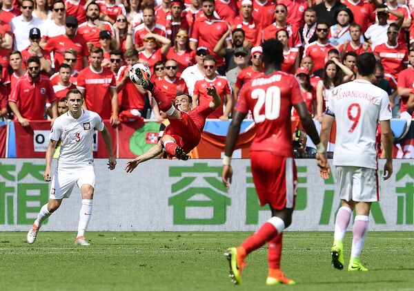 Игровой момент матча Польша - Швейцария